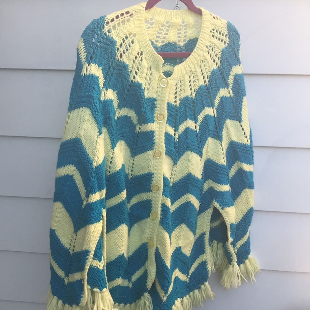 Vintage crocheted poncho/shawl with buttons and fringe